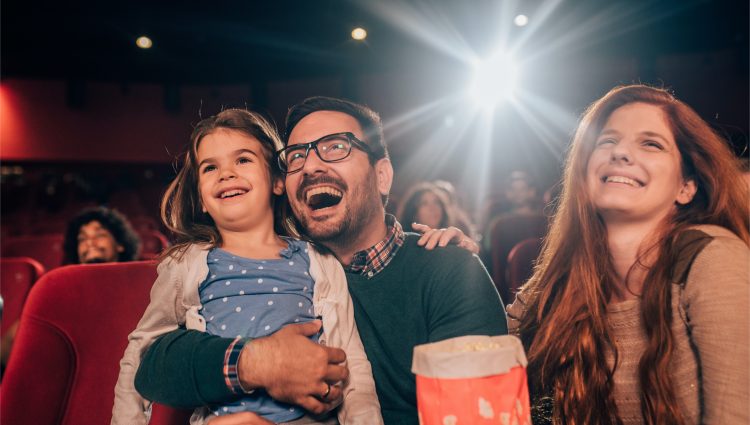 Family watching a movie